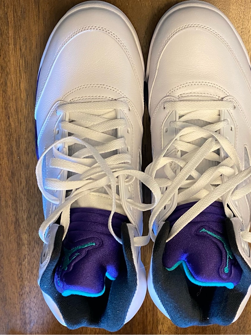 Nike White Sneakers with Purple Tongue and Teal Accents